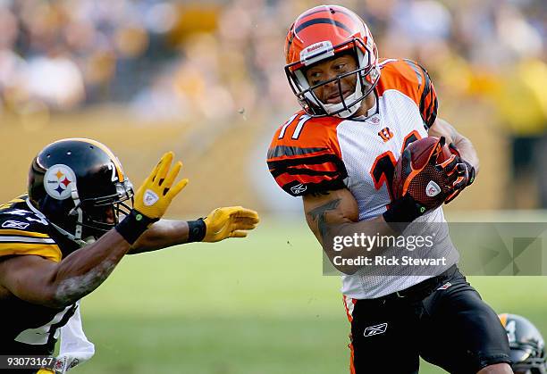 Laveranues Coles of the Cincinnati Bengals runs around Ryan Clark of the Pittsburgh Steelers at Heinz Field on November 15, 2009 in Pittsburgh,...