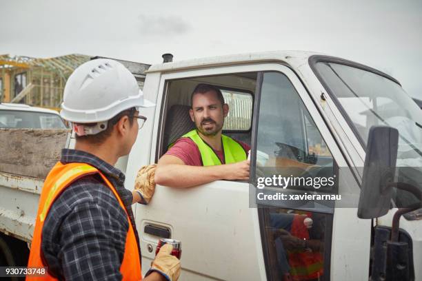 building contractor in truck talking to worker - pick up truck stock pictures, royalty-free photos & images