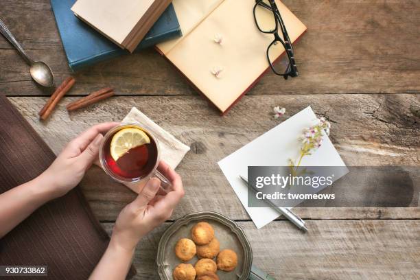 overhead view of tea break food and drink table top image. - cup of tea from above stock pictures, royalty-free photos & images