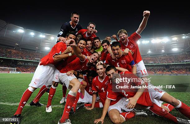 The Switzerland team celebrates at the final whistle as they win the FIFA U17 World Cup during the FIFA U17 World Cup Final match between Switzerland...