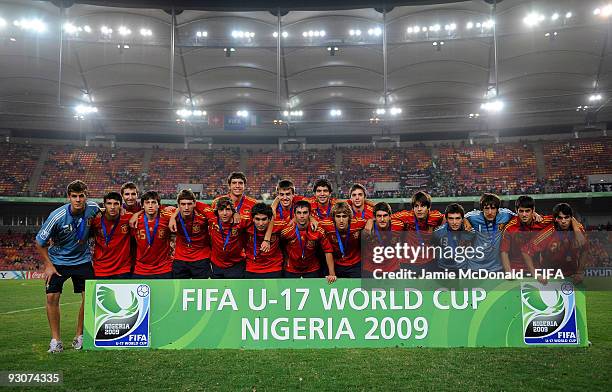 Members of the Spain team line up for a team photo after coming third during the FIFA U17 World Cup Final match between Switzerland and Nigeria at...