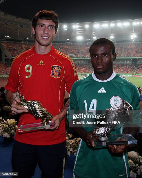 Borja of Spain and Sani Emmanuel of Nigeria pose with the Shoe Trophies after the FIFA U17 World Cup Final between Switzerland and Nigeria at the...