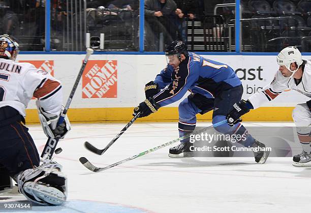 Todd White of the Atlanta Thrashers fires a shot against the Edmonton Oilers at Philips Arena on November 15, 2009 in Atlanta, Georgia.