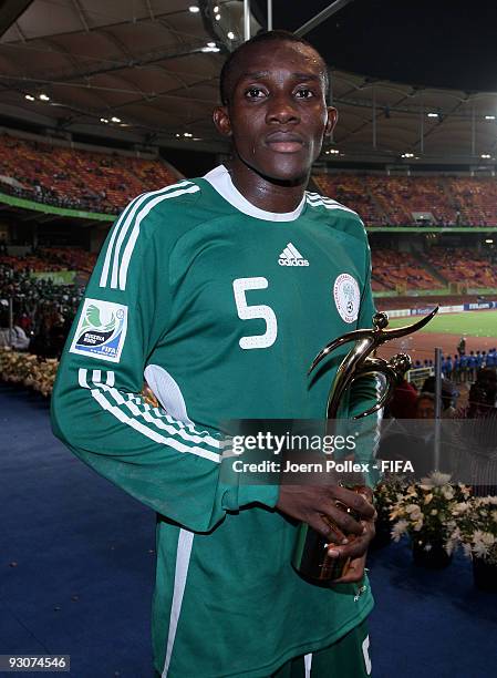 Fortune Chukwudi of Nigeria poses with the Fair Play Award after the FIFA U17 World Cup Final between Switzerland and Nigeria at the Abuja National...