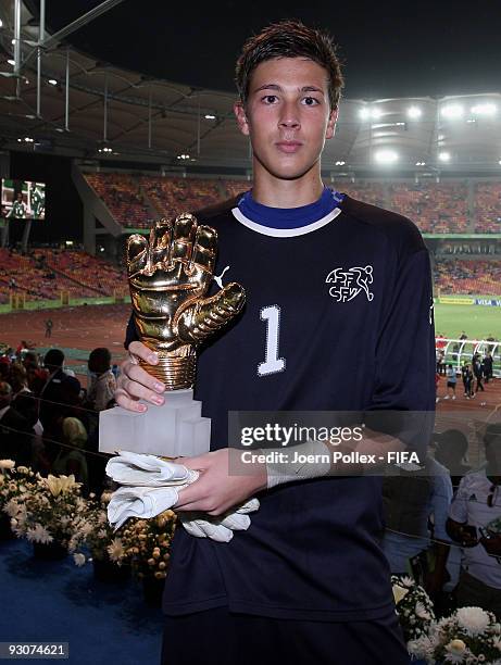 Benjamin Siegrist of Switzerland poses with the Golden Glove Award after the FIFA U17 World Cup Final between Switzerland and Nigeria at the Abuja...