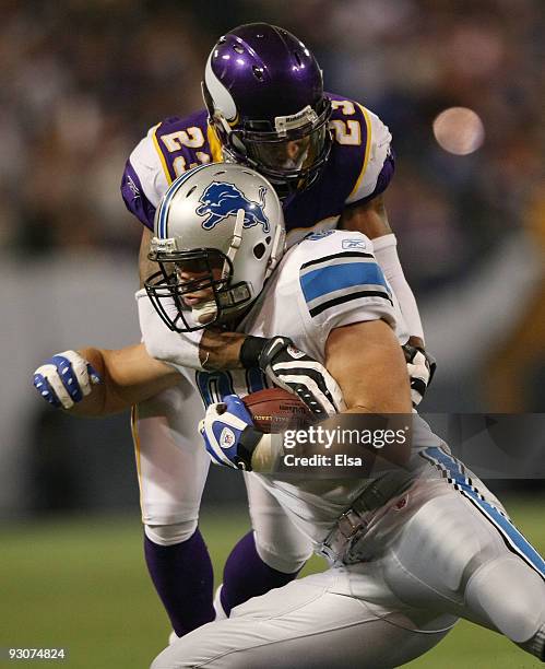 Dennis Northcutt of the Detroit Lions is stopped by Cedric Griffin of the Minnesota Vikings on November 15, 2009 at Hubert H. Humphrey Metrodome in...