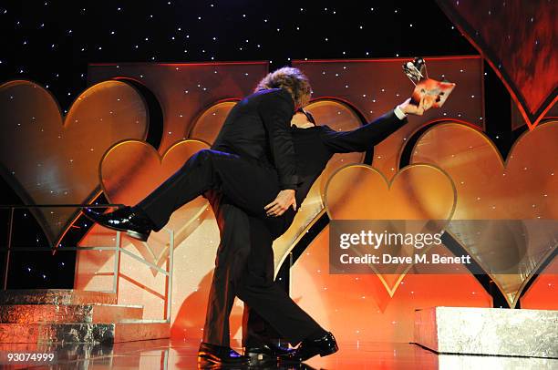 Justin Lee Collins with the Television Presenter of The Year Award presented by Alan Carr attend the Variety Club Showbiz Awards, at the Grosvenor...