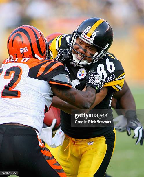 Hines Ward of the Pittsburgh Steelers blocks Jonathan Joseph of the Cincinnati Bengals at Heinz Field on November 15, 2009 in Pittsburgh,...