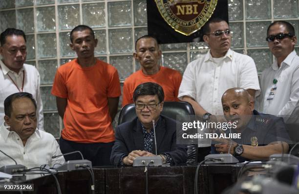 Philippine National Police Chief Director General, Ronald Dela Rosa speaks, while Justice Secretary Vitaliano Aguirre and National Bureau of...
