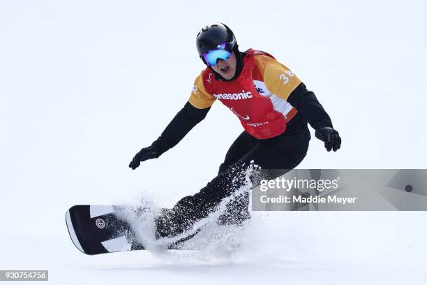 Matti Suur-Hamari of Finland stumbles after celebrating winning the Gold medal in the Men's Snowboard Cross SB-LL2 during day three of the...