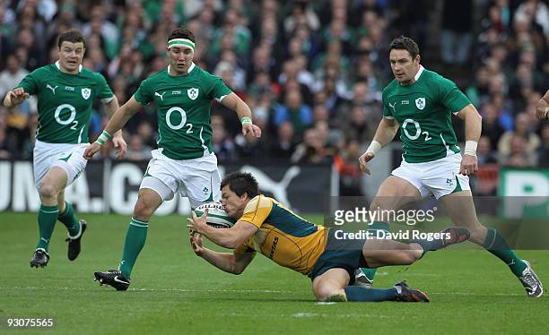 Adam Ashley-Cooper of Australia falls on the loose ball during the rugby union international match between Ireland and Australia at Croke Park on...