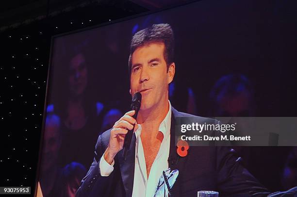 Simon Cowell via video link receives The Daily Mirror Best British TV Judge Award during the Variety Club Showbiz Awards, at the Grosvenor House, on...