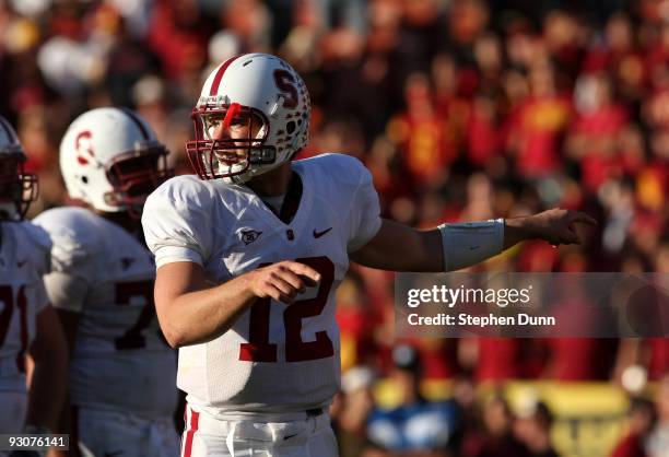 Quarterback Andrew Luck of the Stanford Cardinal points on the field during the game with the USC Trojans on November 14, 2009 at the Los Angeles...