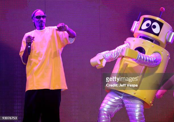 Rapper Snoop Dogg and character Plex perform onstage during the Yo Gabba Gabba! : "There's A Party In My City" Live at The Shrine Auditorium on...