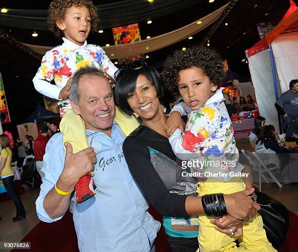 Chef Wolfgang Puck, wife Gelila Assefa, and children Oliver and Alexander attend P.S. Arts Express Yourself 2009 at Barker Hangar at the Santa Monica...