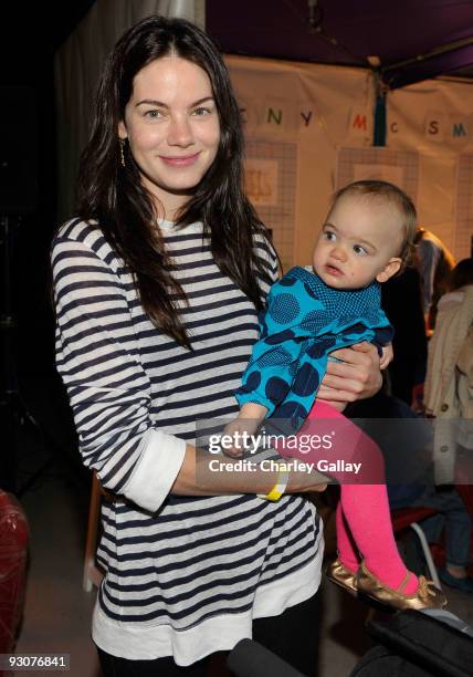 Actress Michelle Monaghan and daughter Willow attend P.S. Arts Express Yourself 2009 at Barker Hangar at the Santa Monica Airport on November 15,...