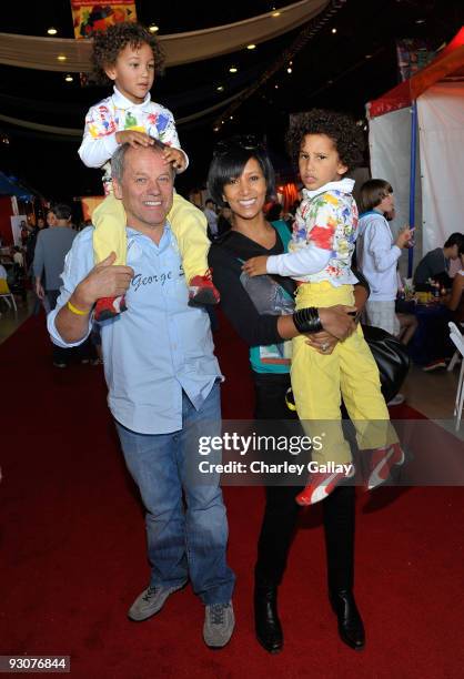 Chef Wolfgang Puck, wife Gelila Assefa, and children Oliver and Alexander attend P.S. Arts Express Yourself 2009 at Barker Hangar at the Santa Monica...