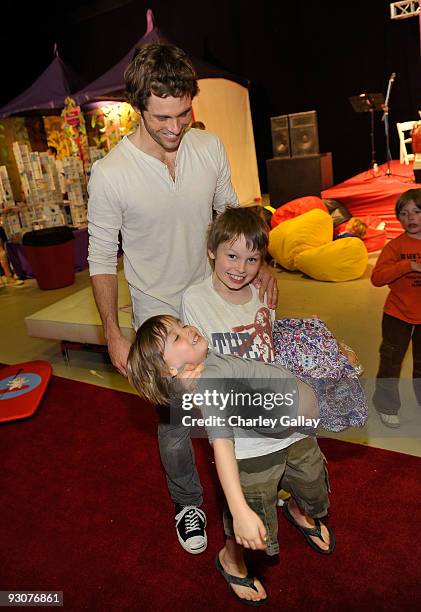 Actor James Marsden with son Jack and daughter Mary attend P.S. Arts Express Yourself 2009 at Barker Hangar at the Santa Monica Airport on November...