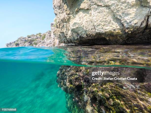 aegean sea, greece - half underwater foto e immagini stock