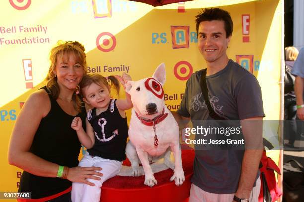 Actress Megyn Price and her family attend the P.S. ARTS ''Express Yourself 2009'' at Barker Hangar on November 15, 2009 in Santa Monica, California.