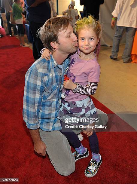 Actor Breckin Meyer and daughter Caitlin attend P.S. Arts Express Yourself 2009 at Barker Hangar at the Santa Monica Airport on November 15, 2009 in...