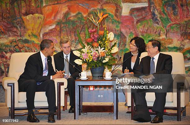 President Barack Obama takes part in a meeting with Shanghai Communist Party Secretary Yu Zhengsheng on November 16, 2009 at the Xijiao State Guest...