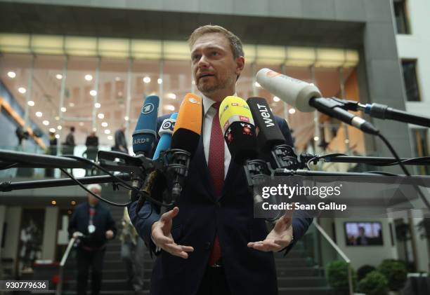 Christian Lindner of the German Free Democrats political party speaks to the media prior to this afternoon's signing of the coalition contract by the...