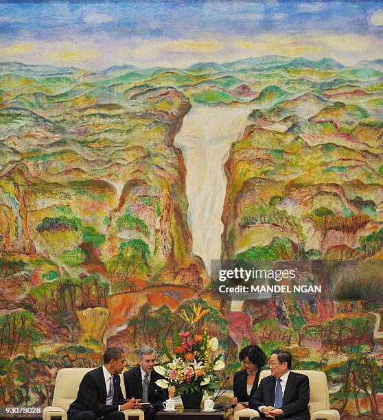 President Barack Obama takes part in a meeting with Shanghai Communist Party Secretary Yu Zhengsheng on November 16, 2009 at the Xijiao State Guest...