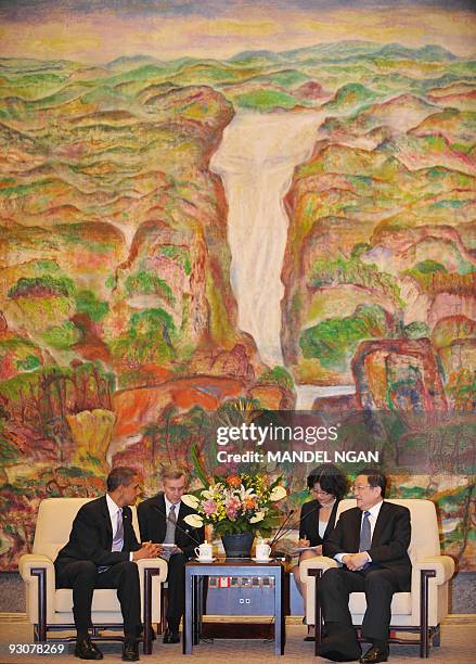 President Barack Obama takes part in a meeting with Shanghai Communist Party Secretary Yu Zhengsheng on November 16, 2009 at the Xijiao State Guest...