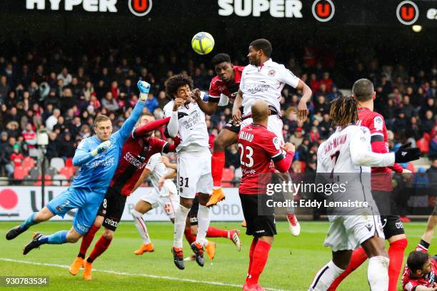 Felix Eboa of Guingamp and Dante of Nice during the Ligue 1 match between EA Guingamp and OGC Nice at Stade du Roudourou on March 11, 2018 in...