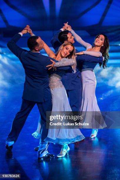 Charlotte Wuerdig with Valentin Lusin and Judith Williams with Erich Klann perform on stage during the pre-show 'Wer tanzt mit wem? Die grosse...