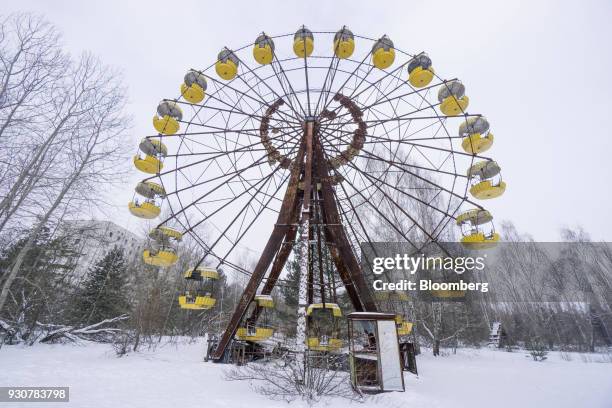 An abandoned ferris wheel stands in a former theme park in the evacuated city of in Pripyat, Ukraine, on Wednesday, Feb. 28, 2018. Solar Chernobyl...
