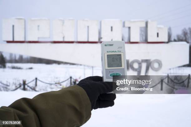 Radiation dosimeter displays the level of radioactive contamination near the evacuated city of Pripyat, Ukraine, on Wednesday, Feb. 28, 2018. Solar...