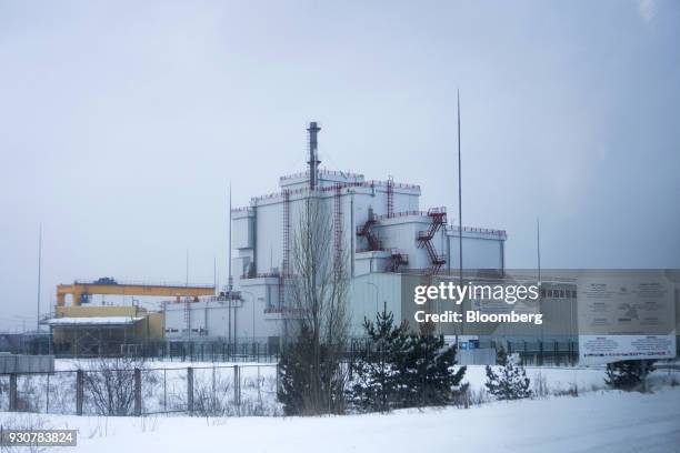 Spent radioactive waste storage facility operates near the shut down nuclear power station in Chernobyl, Ukraine, on Wednesday, Feb. 28, 2018. Solar...