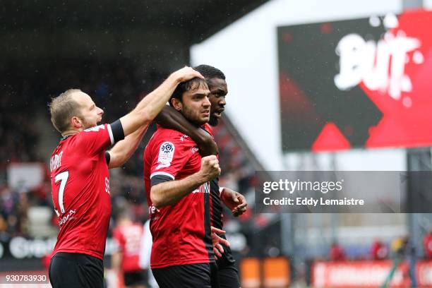 Clement Grenier of Guingamp celebrates after scoring a goal during the Ligue 1 match between EA Guingamp and OGC Nice at Stade du Roudourou on March...