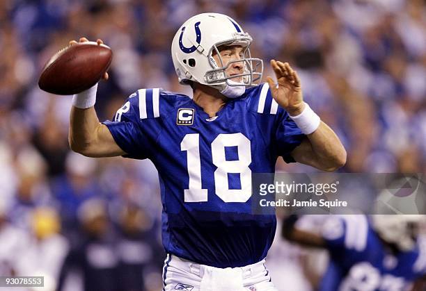 Quarterback Peyton Manning of the Indianapolis Colts throws the ball in the third quarter of the game against the New England Patriots at Lucas Oil...
