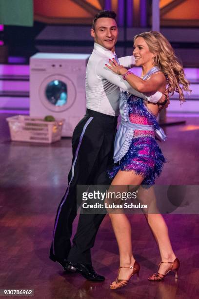 Julia Dietze performs on stage during the pre-show 'Wer tanzt mit wem? Die grosse Kennenlernshow' of the television competition 'Let's Dance' on...