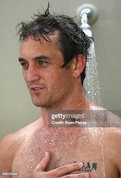 Daniel Bradshaw of the Swans showers during a Sydney Swans AFL training session at the Sydney Cricket Ground on November 16, 2009 in Sydney,...