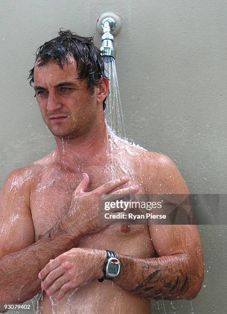 Daniel Bradshaw of the Swans showers during a Sydney Swans AFL training session at the Sydney Cricket Ground on November 16, 2009 in Sydney,...