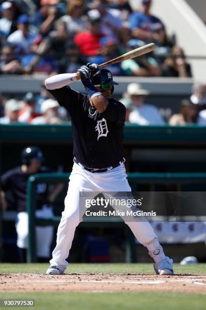 Victor Martinez of the Detroit Tigers gets ready for the next pitch during the game against the New York Mets at Joker Marchant Stadium on March 09,...