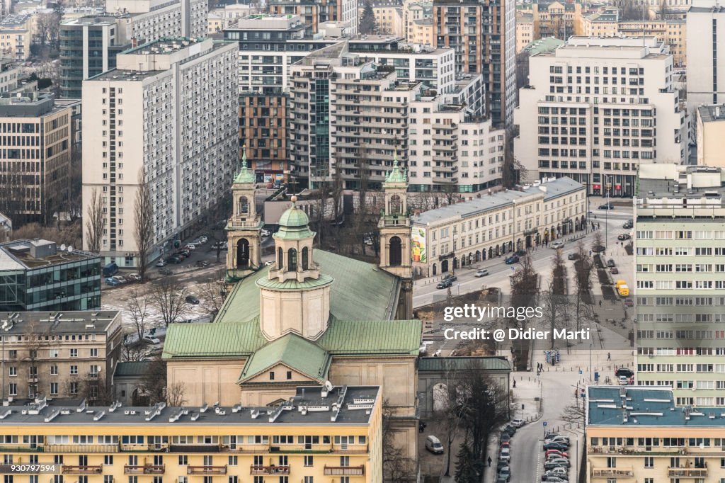 Aerial view of a church and apartment blocks in Warsaw in Poland