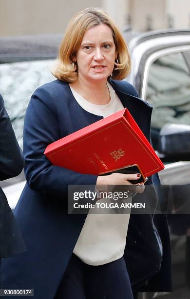 Britain's Home Secretary Amber Rudd arrives in Downing Street in central London on March 12 ahead fo a meeting of the National Security Council, as...