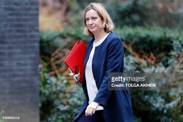 Britain's Home Secretary Amber Rudd arrives in Downing Street in central London on March 12 ahead fo a meeting of the National Security Council, as...