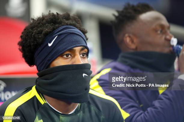 Tottenham Hotspur's Danny Rose wraps up from the cold
