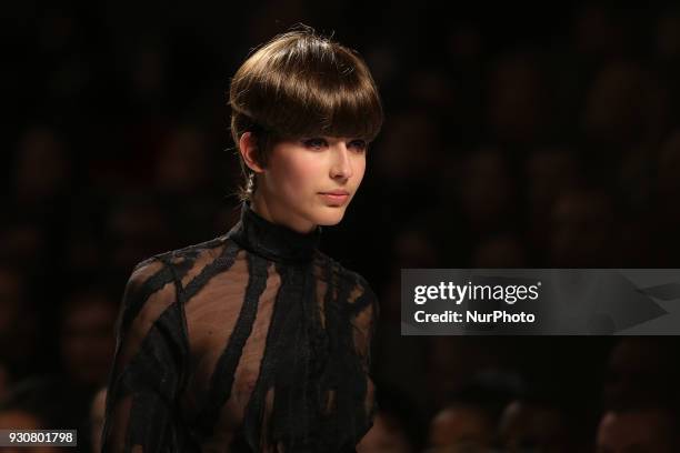 Model walks the catwalk during the fashion designer Luis Carvalho Fall / Winter 2018 - 2019 collection runway show at the 50 edition of Lisboa...