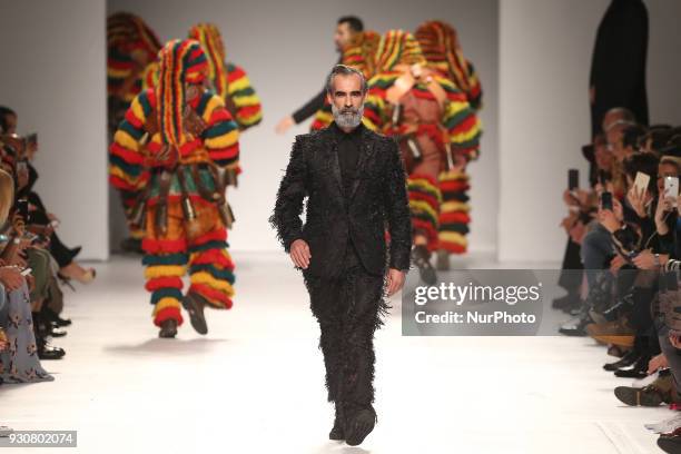 Model walks the catwalk during the fashion designer Nuno Gama Fall / Winter 2018 - 2019 collection runway show at the 50 edition of Lisboa Fashion...