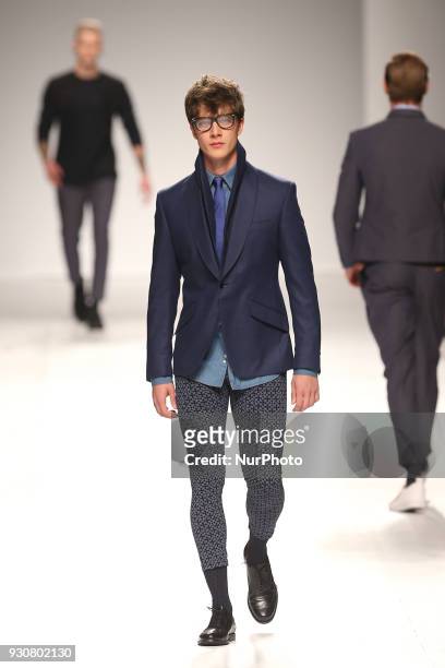 Model walks the catwalk during the fashion designer Nuno Gama Fall / Winter 2018 - 2019 collection runway show at the 50 edition of Lisboa Fashion...