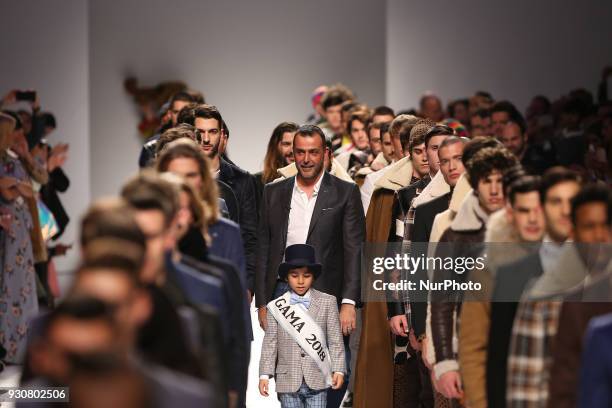 Portuguese fashion designer Nuno Gama acknowledges cheers after presenting the Fall / Winter 2018 - 2019 collection during the Lisbon Fashion Week -...