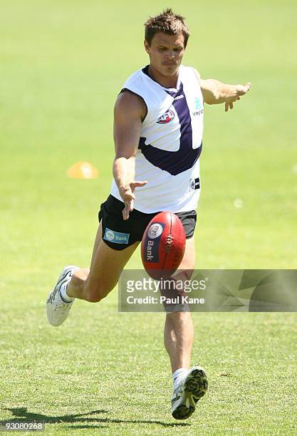 Byron Schammer of the Dockers kicks the ball during a Fremantle Dockers AFL training session at Fremantle Oval on November 16, 2009 in Perth,...