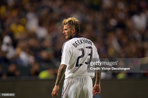 David Beckham of the Los Angeles Galaxy looks at the assistant referee during the MLS Western Conference Championship match against the Houston...